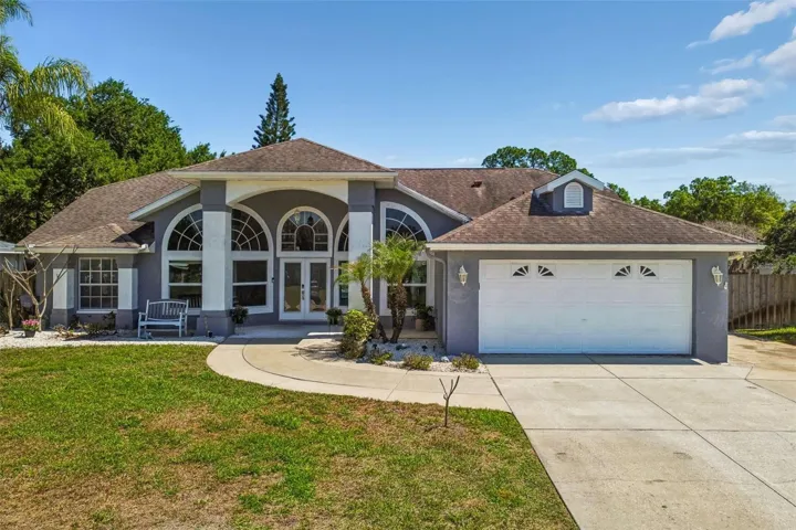 Land O' Lakes...home to many lakes! This home is located within Lake Padgett Estates, across the street from Lake Saxon...one of 3 private lakes for the use of this property!