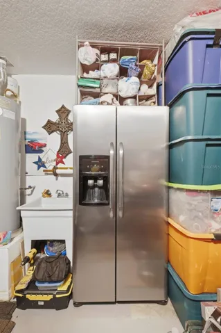Stainless Steel Fridge to be placed in kitchen and left with property.