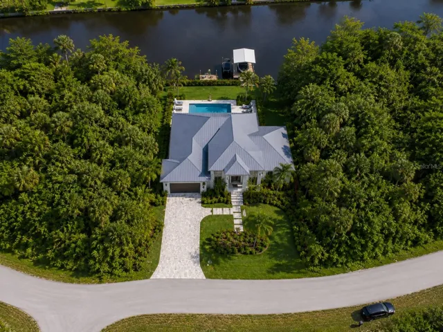 Conceptual rendering for illustration purposes only. Depicts one possible residence and improvements. Home, pool, dock, landscaping and other improvements shown do not currently exist and are not included. Buyer to verify buildability, setbacks, permitting and feasibility.