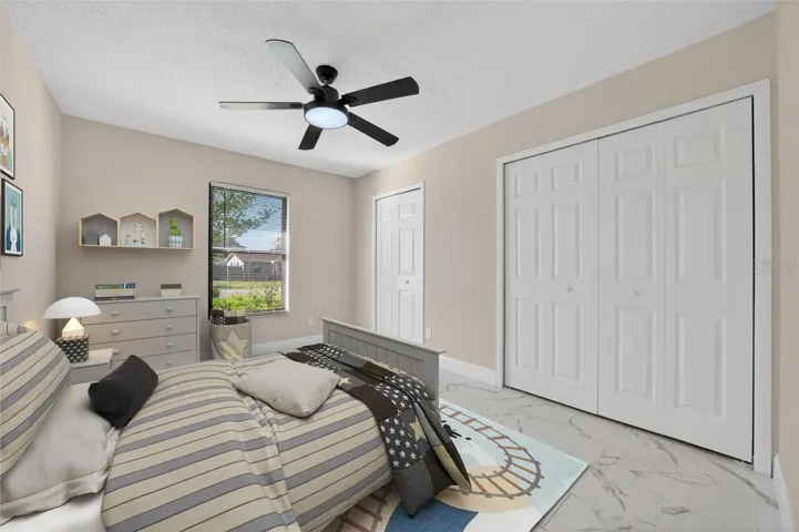 Bedroom 2 Virtually Staged - Double closets