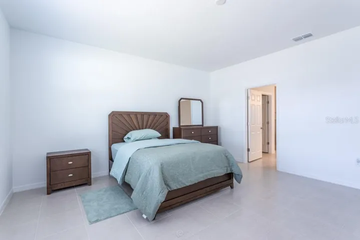 King size primary bedroom with access to main  bathroom
