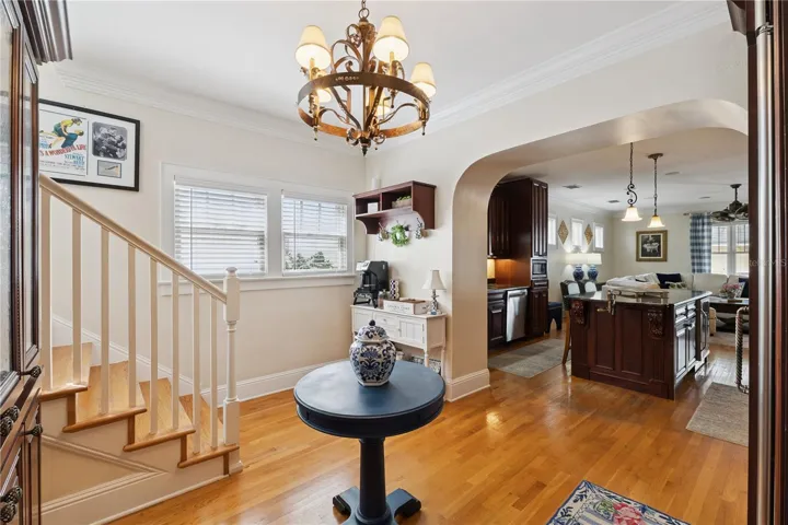 Dinette area with pantry, built in cabinetry and custom refrigerator