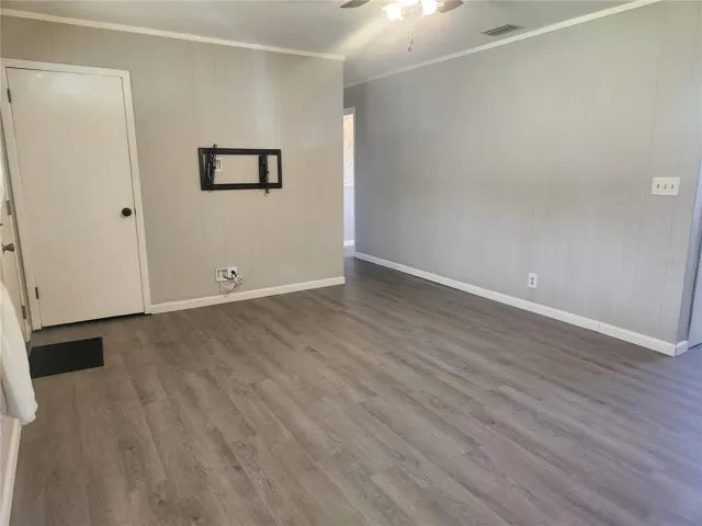 Living Room laminate/wood floors and fans in every room