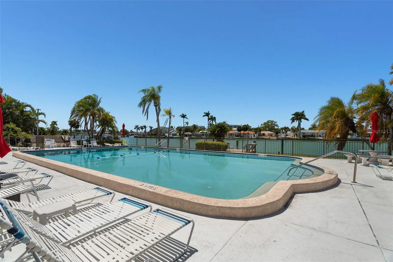 Heated waterfront pool overlooking Boca Ciega Bay