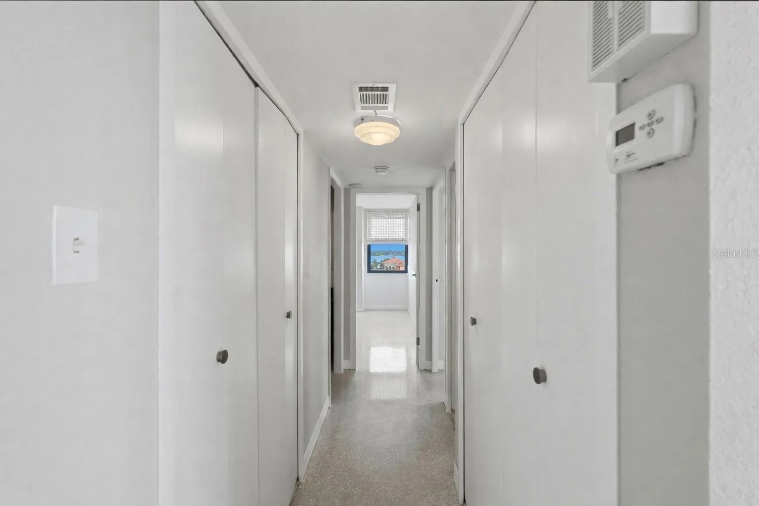 Hallway area - closets on both sides plenty of storage