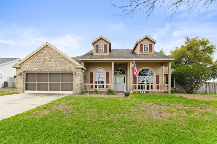 SOLAR SAVINGS, private SCREENED POOL, and a spacious .27 ACRE CORNER LOT set the tone for this beautifully maintained single-story home in the Hidden Lake Estates of Groveland!