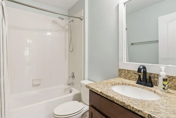 another full bathroom upstairs with 1 sink