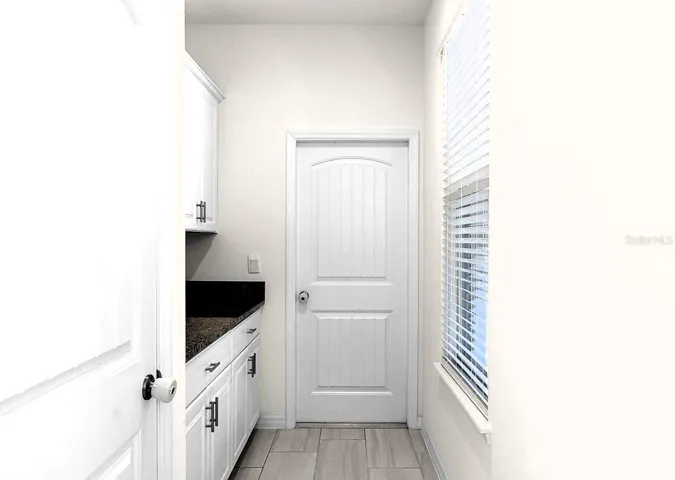 Storage Closet PLUS Drop Zone with 6 Feet of Cabinets for Extra Storage!