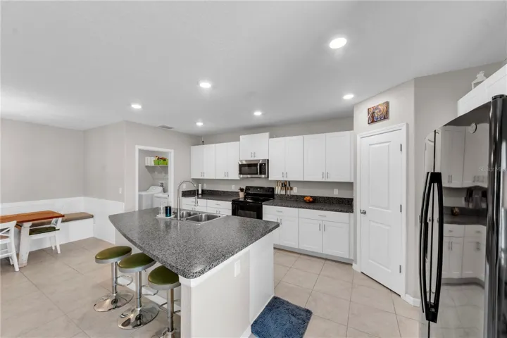 HUGE KITCHEN ISLAND! (Your laundry room leads to your 2-car garage.)