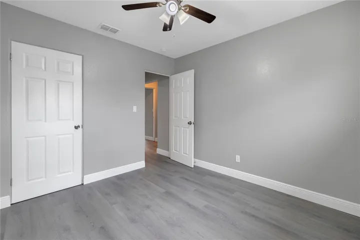 Primary bedroom with walk in closet