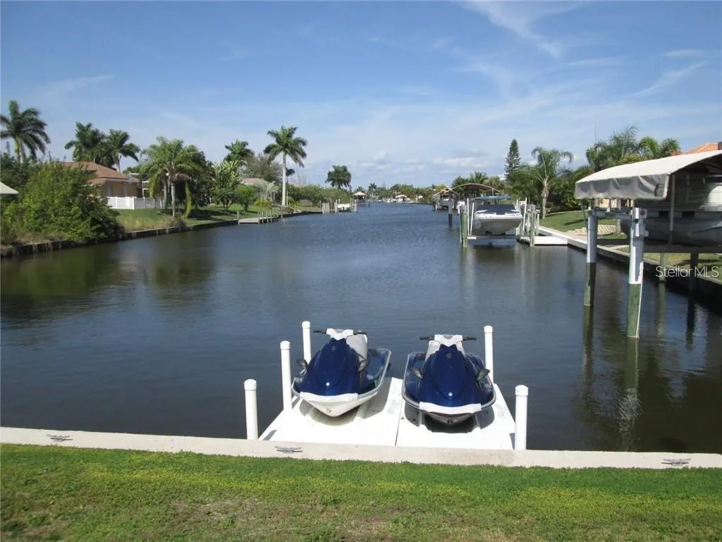 Double Jet Ski dock at seawall.