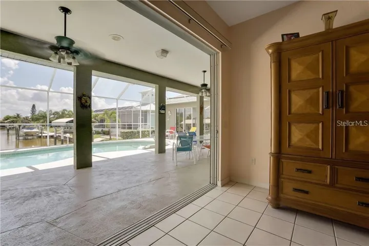 Master suite with sliders that open up the outside for water view