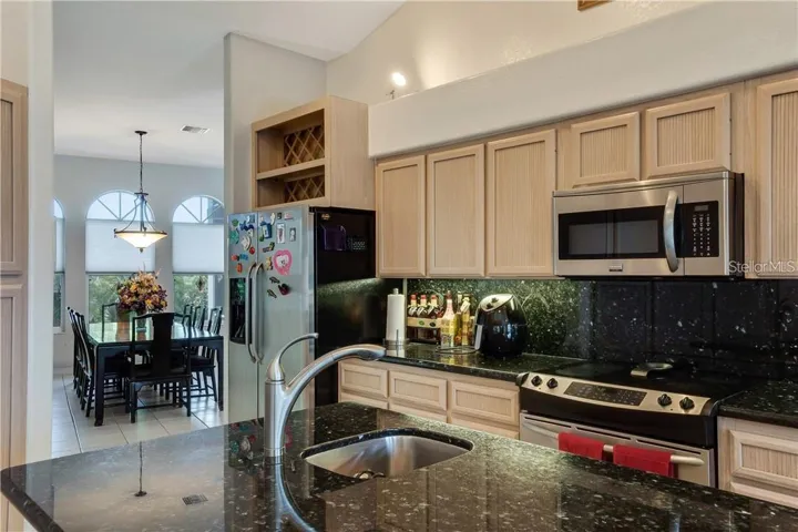Kitchen in to dining room- Prep bar with sink