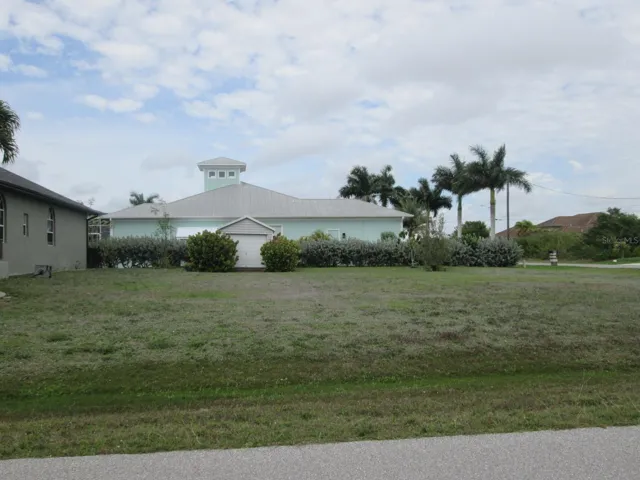 Lot next door is included in sale.