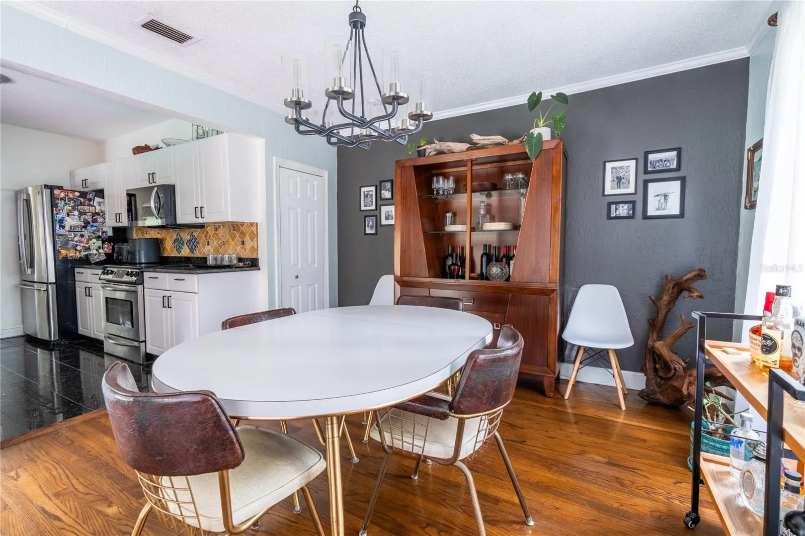 Dining area directly off kitchen and outdoor access to resort style pool!
