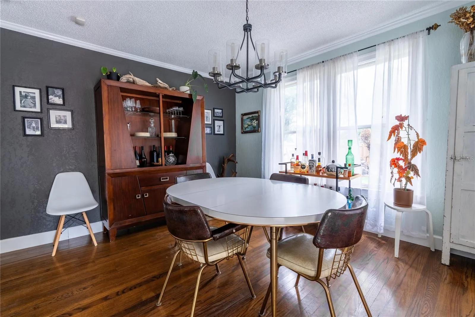 Dining area directly off kitchen and outdoor access to resort style pool!