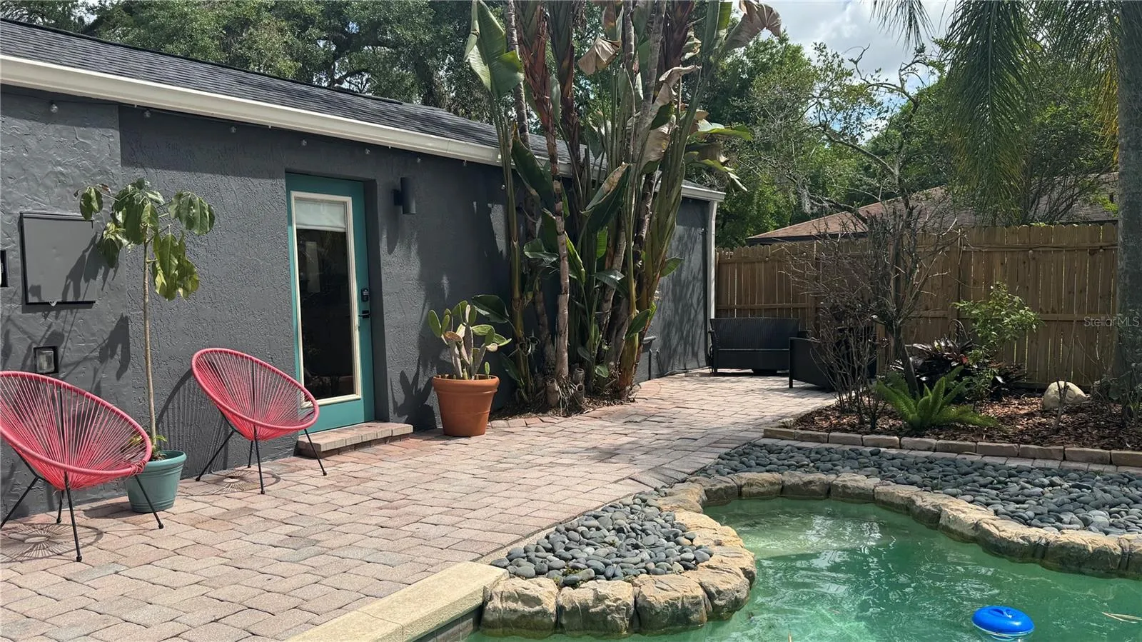 Guesthouse access from resort style pool