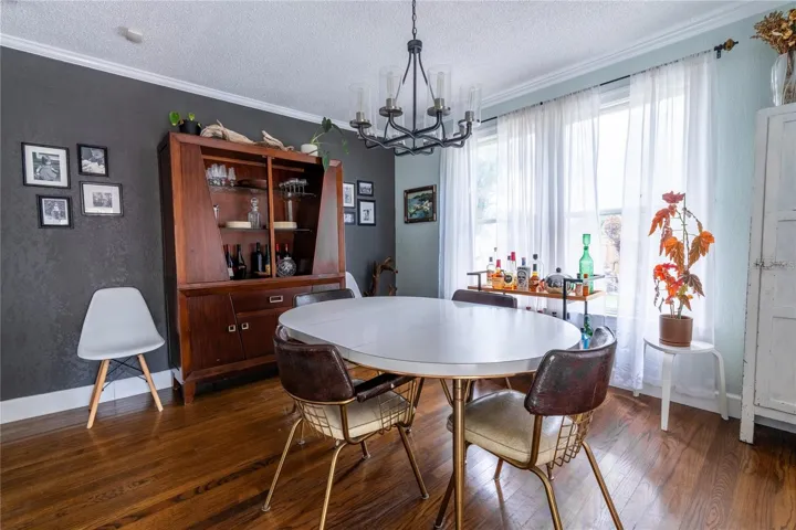 Dining area directly off kitchen and outdoor access to resort style pool!