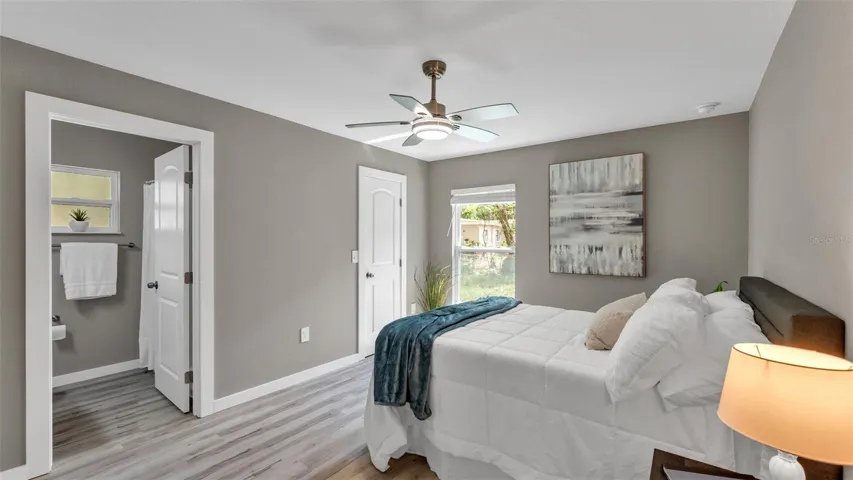 Primary bedroom with walk-in closet