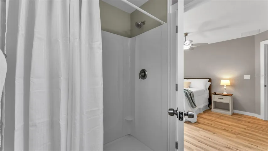Primary bathroom with shower stall