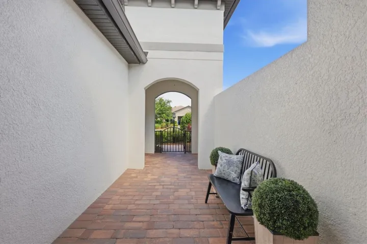 Gated courtyard entry.
