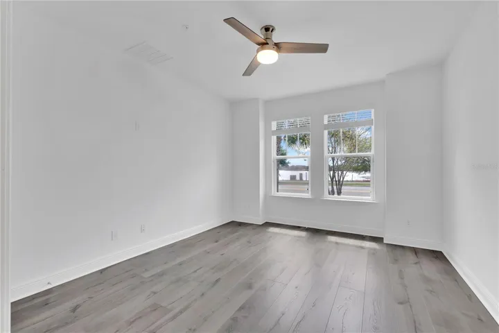 Primary Bedroom with Lake View - Downstairs