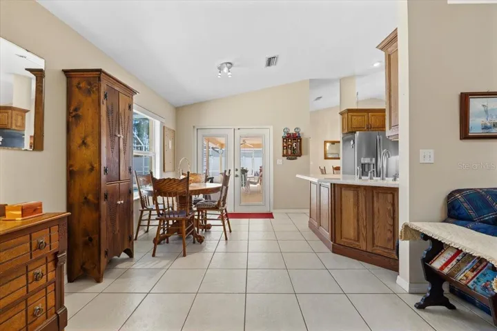 Charming eat-in kitchen space offering a casual dining area with easy access to the lanai