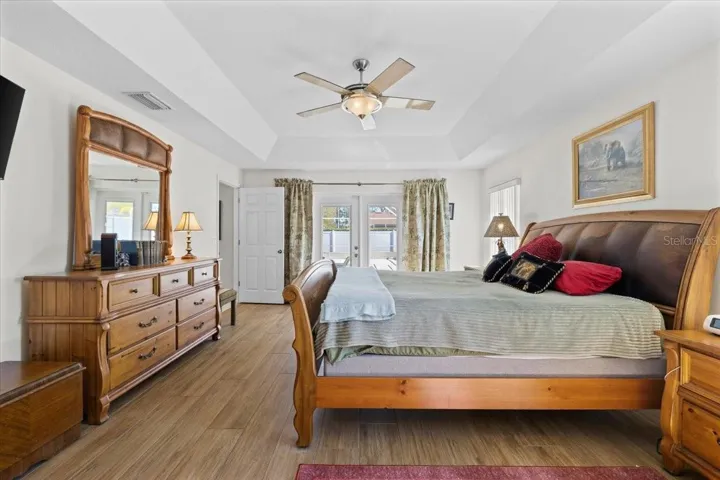 Primary bedroom with private access to the pool.