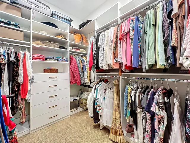 2 Primary Closets with Custom Closet System