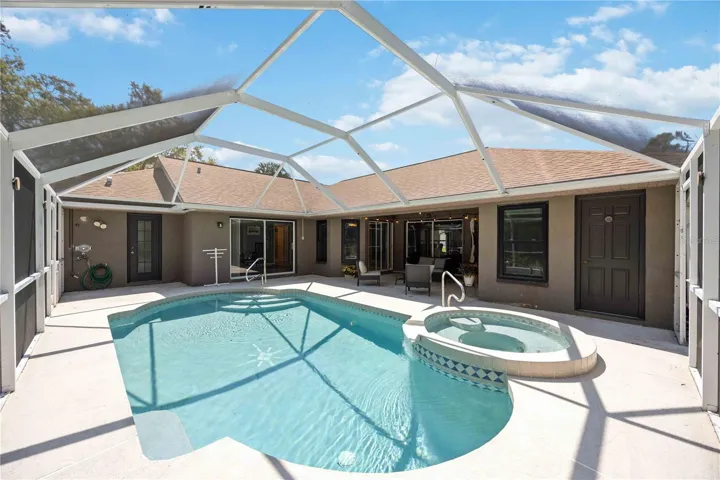 Heated pool with spa