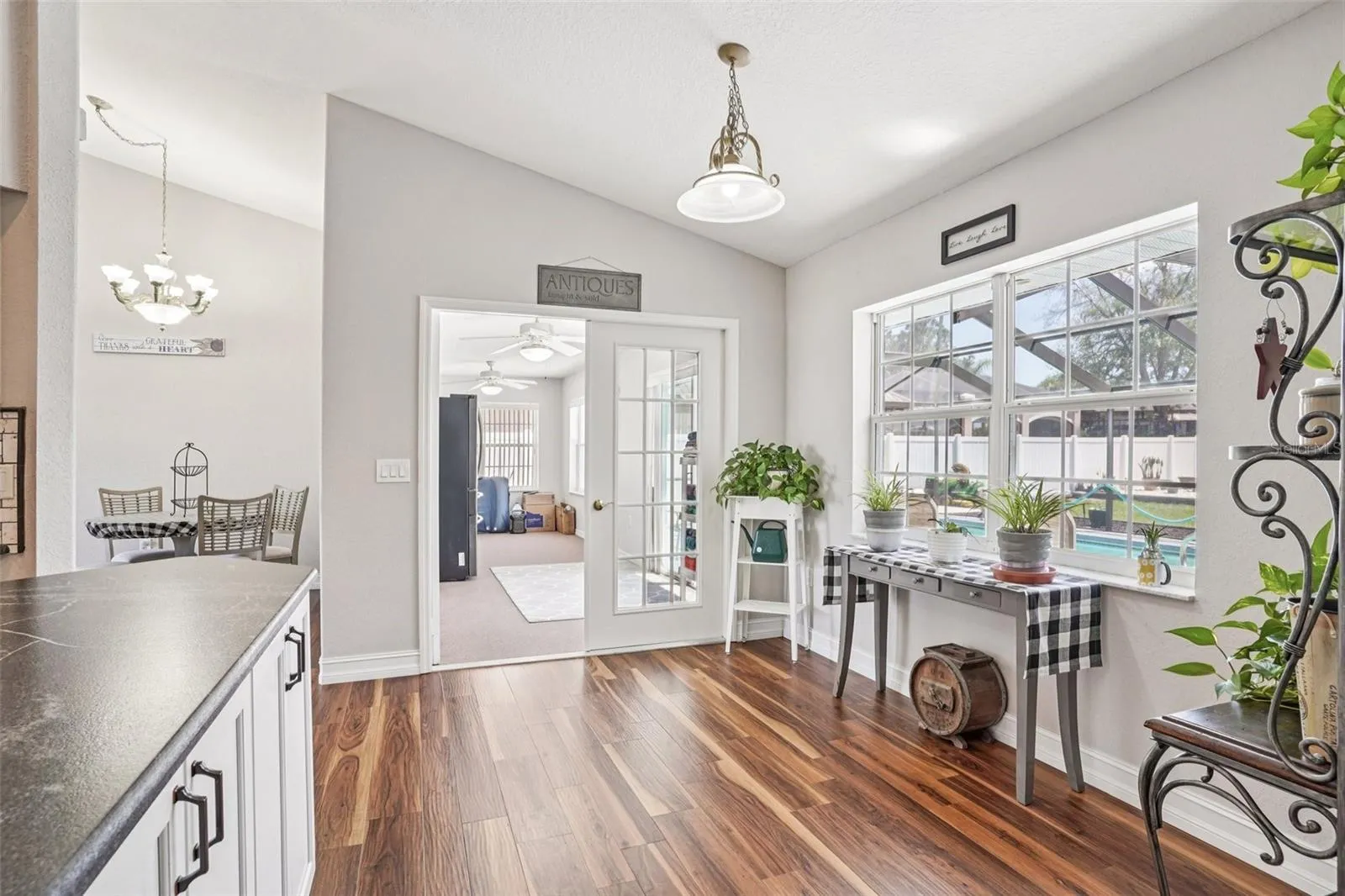 Breakfast nook and french doors to the Florida room and pool