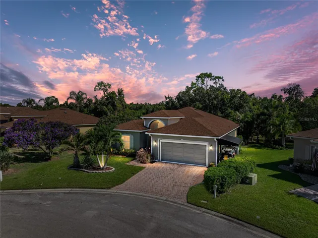 Beautiful Biscayne floor plan home on pond frontage lot.