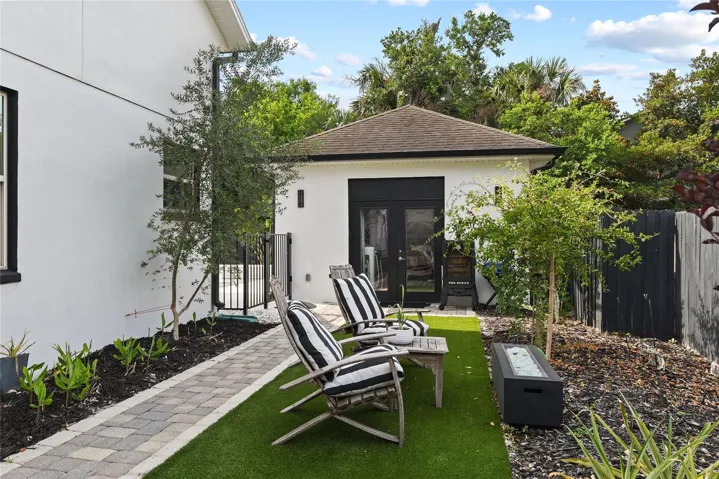 Side yard to guest house.