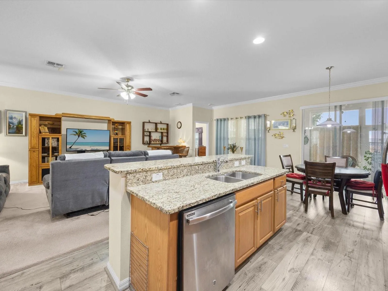 Kitchen with view into family room and breakfast nook