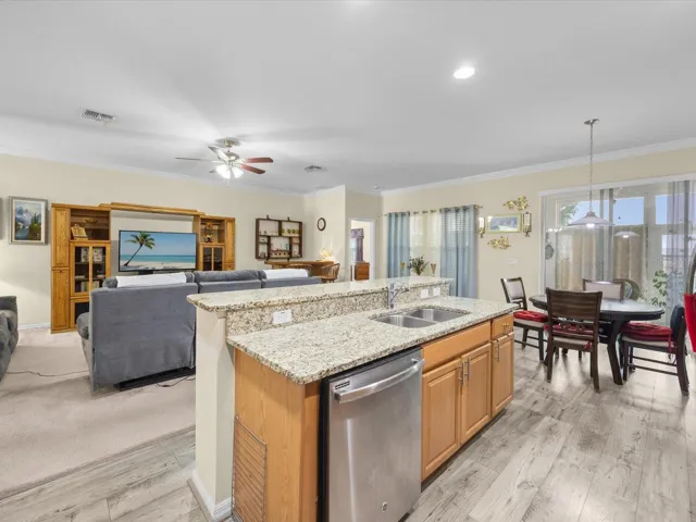 Kitchen with view into family room and breakfast nook