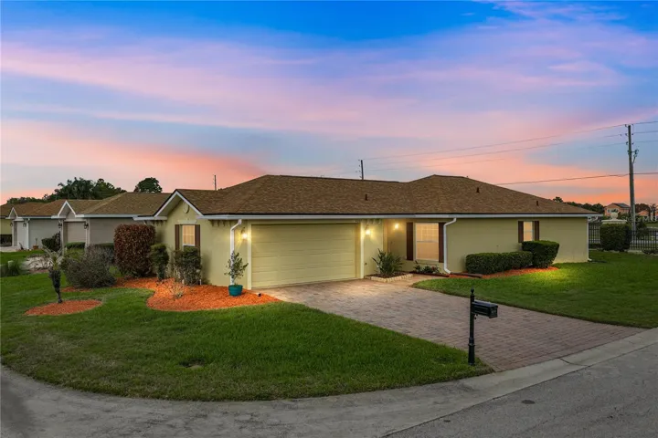 This unique Marbella floor plan home is located on a large corner lot.