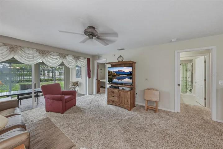 The doorway on the left leads to the primary suite.
