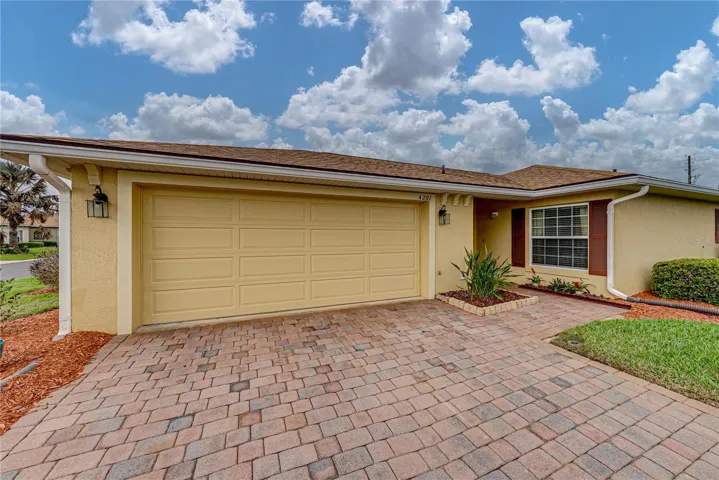 The attached 2 car garage has a garage door opener.