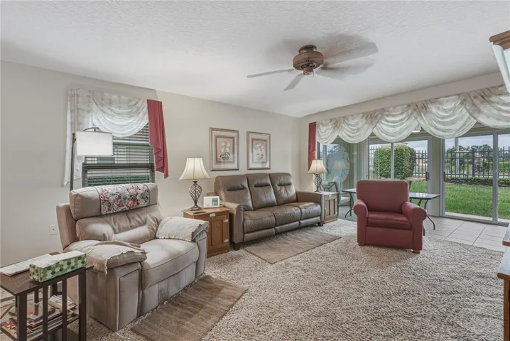 At the north end of the living room is the fully enclosed lanai. This bonus space is not included in the stated square footage, but is very usable space.