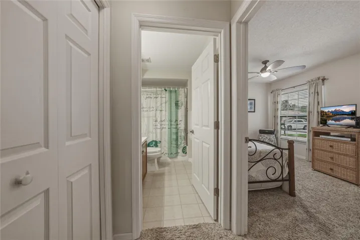 The guest bath is easily accessible from the guest bedroom.