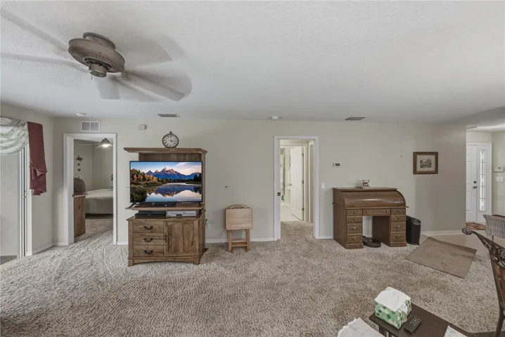 The east wing of this home holds the primary and guest suites.
