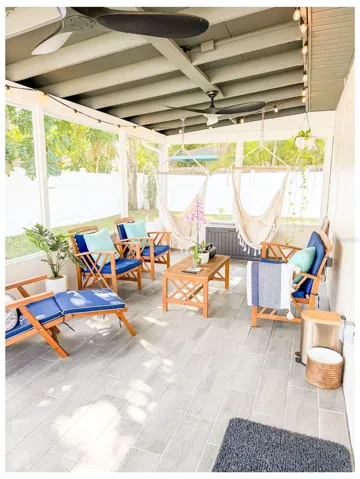 Large screened porch increases your living space.  The perfect spot for coffee in the morning or a glass of wine in teh evening.  Enter from the family room through NEW sliding glass doors.