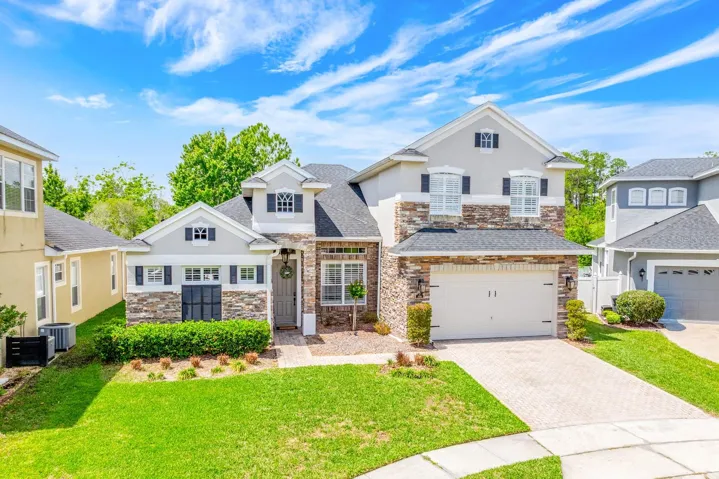 A true showpiece in the gated Tudor Grove at Timber Springs community, this FULLY REMODELED 4-bedroom, 3.5-bath, two-story home blends thoughtful DESIGN, modern LUXURY and an incredible INDOOR/OUTDOOR LIFESTYLE in one of East Orlando’s most desirable locations!
