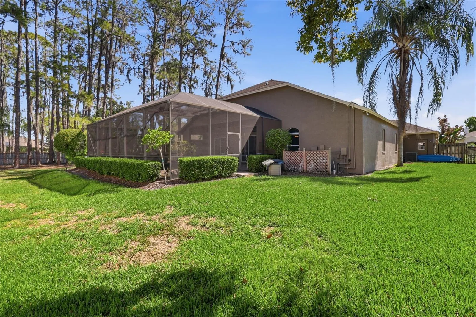 Large private backyard with lush landscaping—perfect for relaxing, entertaining, or outdoor activities