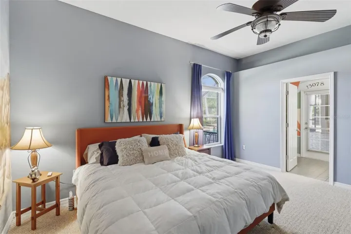 Versatile guest bedroom with walk-in closet and easy access to the pool bath