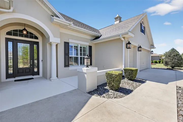 Front Entry and Patio with Seating Wall