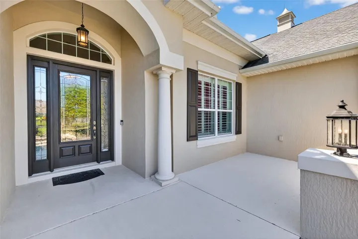 Front Entry and Patio with Seating Wall