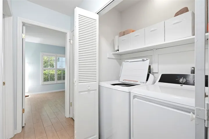 Laundry closest in hallway close to both bedrooms