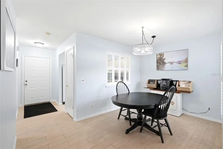 Dining room with kitchen pass through on left