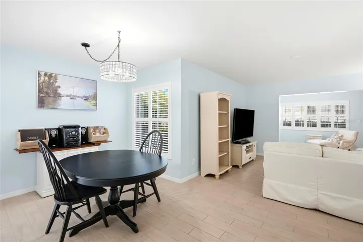 Dining room with living room in background